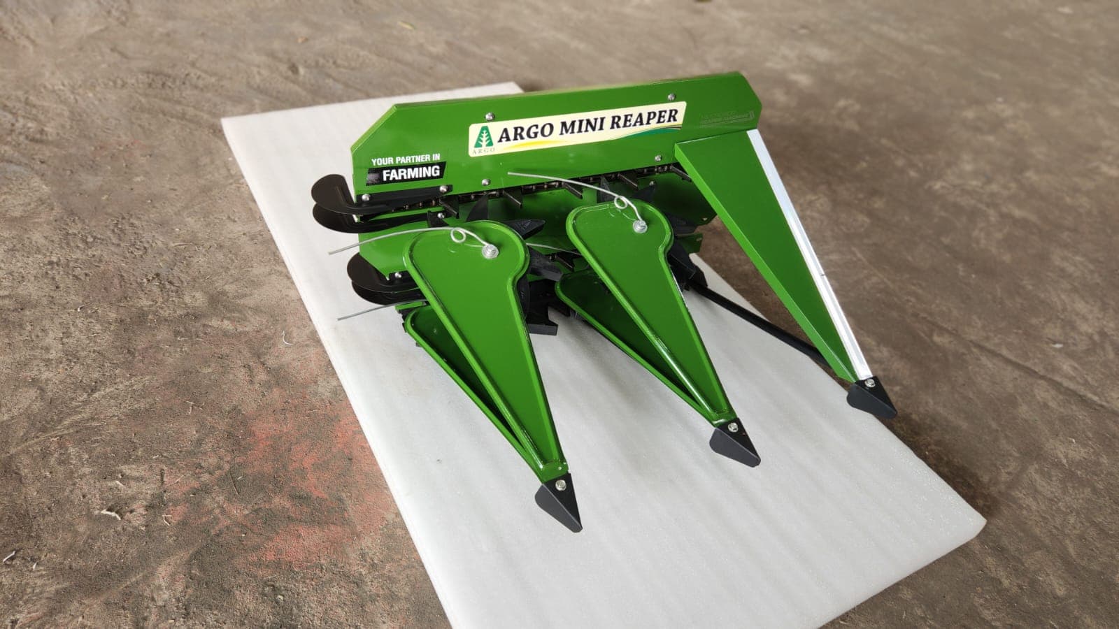 Green reaper header on foam pad